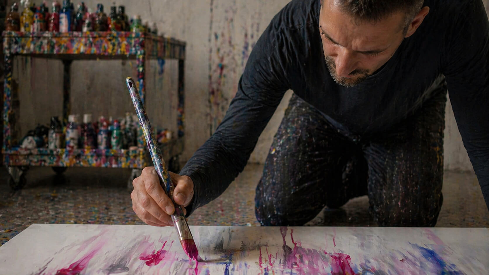 Emanuele Fortunati painting in his studio